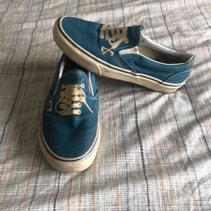 Vans slip on. Faux laces.